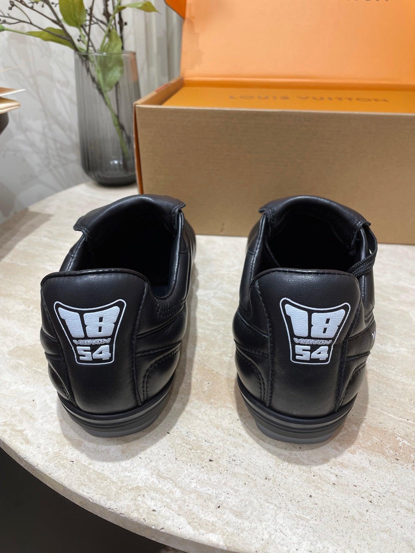LOUIS VUITTON FOOTPRINT SOCCER SNEAKER IN BLACK CALFSKIN