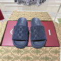 GUCCI SLIDES IN NAVY BLUE SUEDE WITH EMBOSSED LOGO STYLE 4
