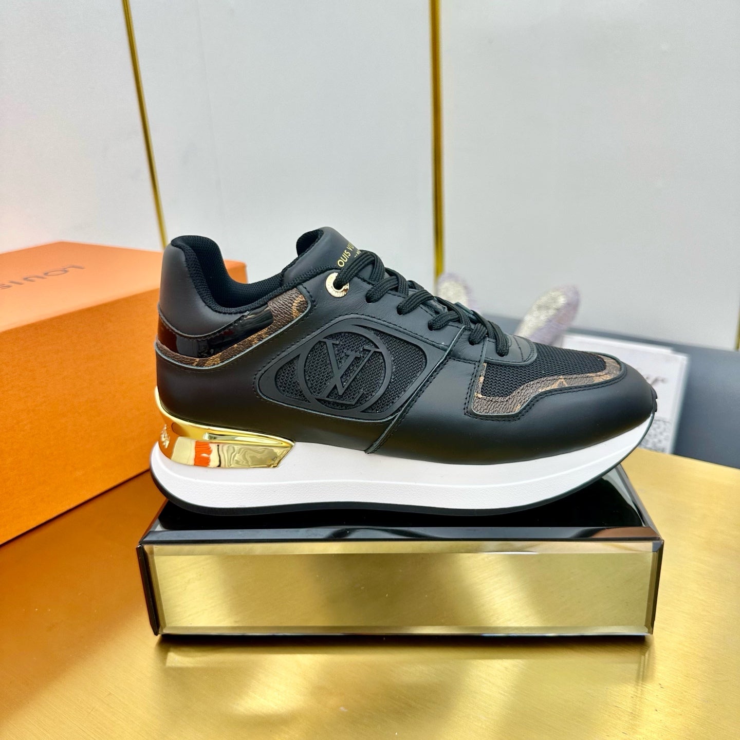 LOUIS VUITTON NEO RUN AWAY SNEAKER IN BLACK CALFSKIN